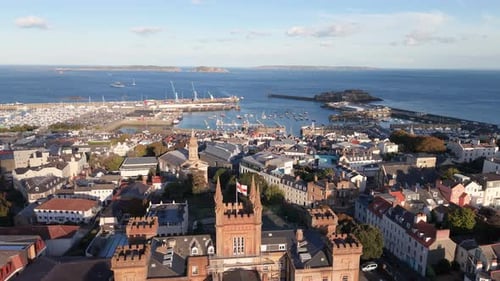 View from Elizabeth College across St James and rooftops of St Peter Port Guernsey towards harbour