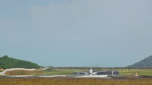Passenger Plane Takes Off on Runway