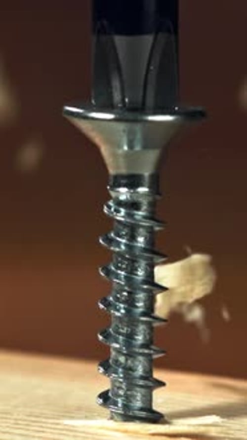 Screwing the Screw Into the Board Filmed on a Highspeed Camera at 1000 Fps