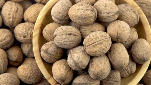 Walnut in Shell Background View From Above Healthy Food Bowl Top View