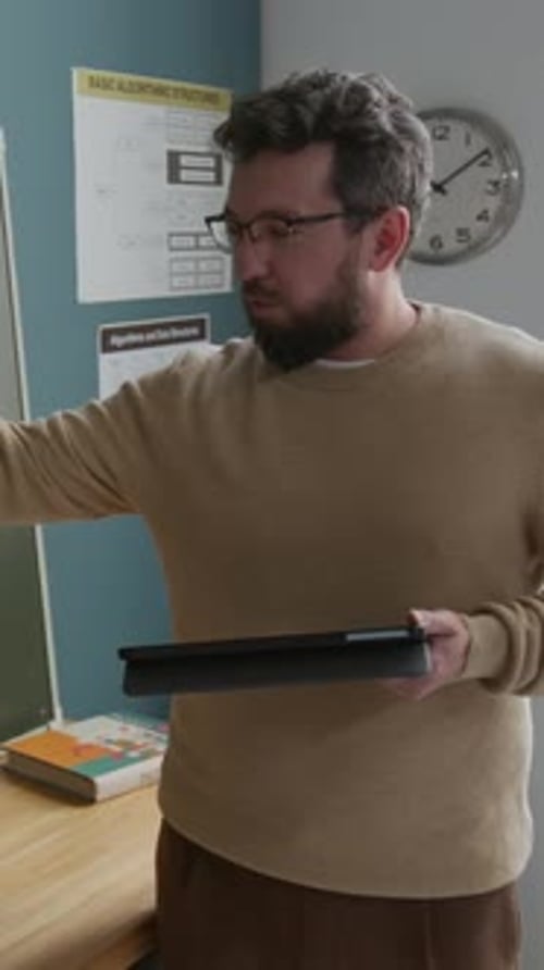 Vertical of Caucasian Male Coding Teacher Explaining Algorithm at Lesson