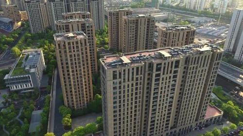 Highrise Residential Buildings Stand Amidst Lush Greenery Showcasing a Blend of Nature and Urban