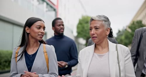 City discussion, walking and business women, intern lawyer or senior advocate on morning trip