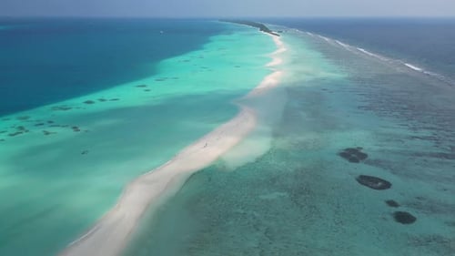 Stunning Blue Ocean and Sandy White Island Maldives Top Drone Aeral View Deserted Hidden Beach