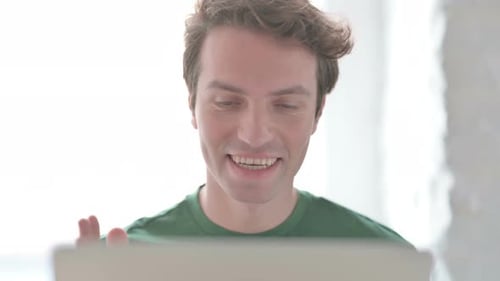 Close Up of Young Man Doing Video Chat on Laptop