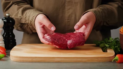 Man Chef Cooking Beef Steak Angus Closeup Macro Professional Cheif Preparing Meat in Restaurant