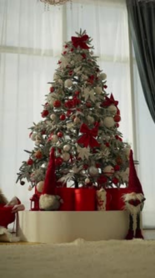 Festive Christmas Tree Decorated with Red and Silver