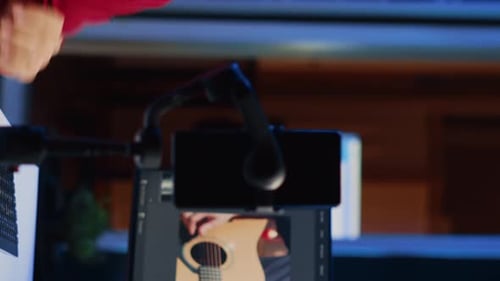 Young Adult Editing Audio and Photos