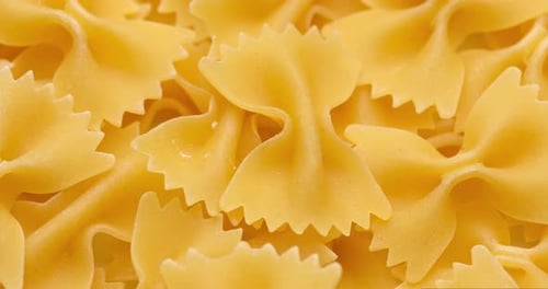 Pasta Backgroud Macro View of Dry Authentic Italian Farfalle