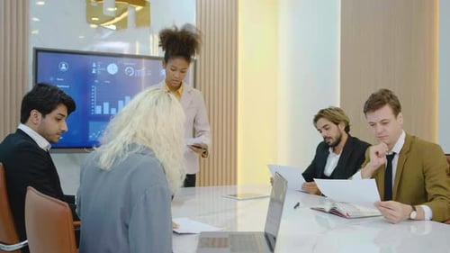 Diverse Team Meeting and Celebrating Success