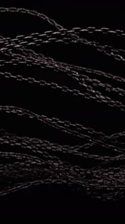 Abstract background with tangled chains. Shiny metallic texture, fashion intro. 3d animation