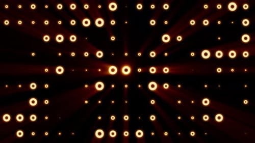 Abstract background of bright orange glowing light bulbs from circles and dots