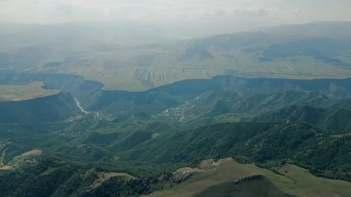 Lush Mountain Range and Valley Aerial View