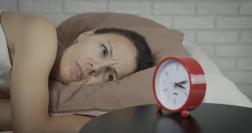 Girl Can Not Sleep in Bed