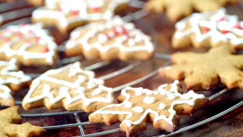 Decorating Gingerbread Cookies with Icing for Christmas Holiday