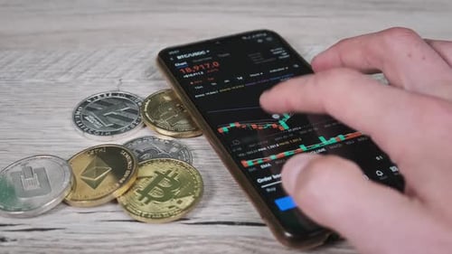 Investor Checking Cryptocurrency Price on Smartphone Screen Bitcoin Price