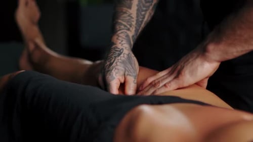 Person Receiving Leg Massage at Home