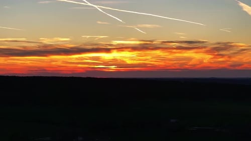 Sunset Over Rural Landscape Aerial View