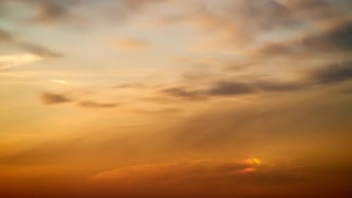 Golden Sunset Sky with Moving Clouds