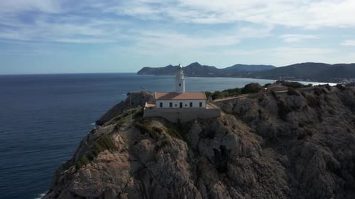 Coastal Lighthouse Aerial View on Rocky Cliff
