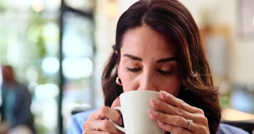 Thinking, drinking coffee and woman in cafe for relax, morning inspiration or idea