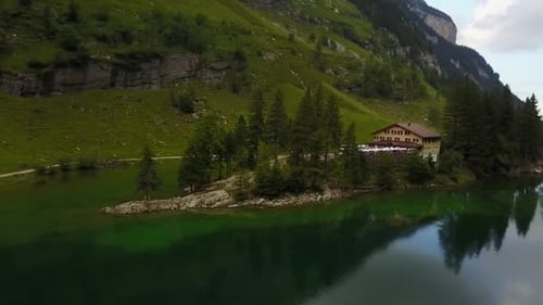 Scenic Lake Surrounded by Mountains in Rural Landscape