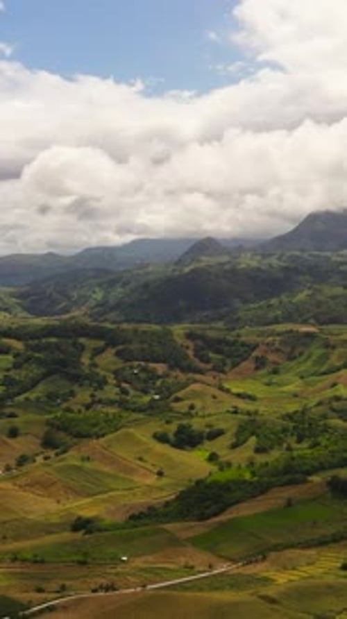Lush Green Valley and Hills Aerial View