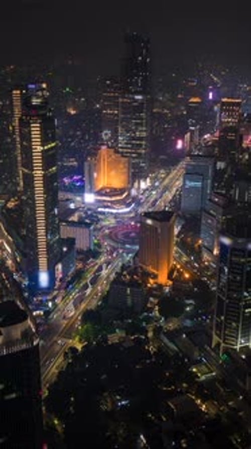 Aerial Timelapse Of Evening Traffic In Business District In Jakarta Indonesia