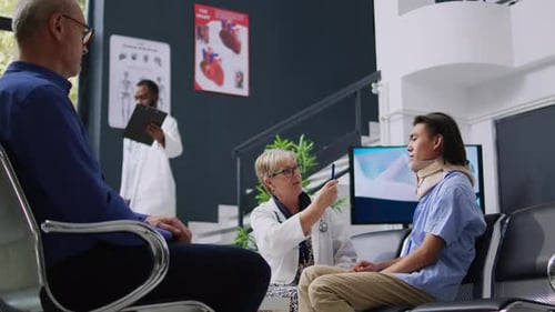 Doctor Consulting with Patient in Waiting Room