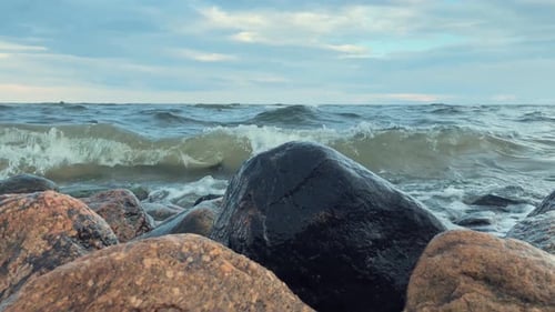Waves hitting rock. Calm sea waves.