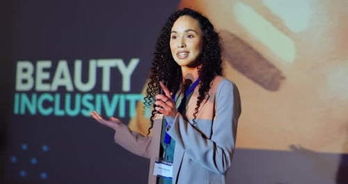 Woman Speaking at Business Conference on Inclusivity