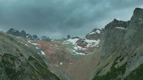 Aerial View of Rocky Mountain Range With Snow