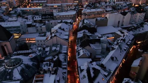 Aerial shot of Bonn city at night in winter. Snow covered city at night. city lights at night, Germa