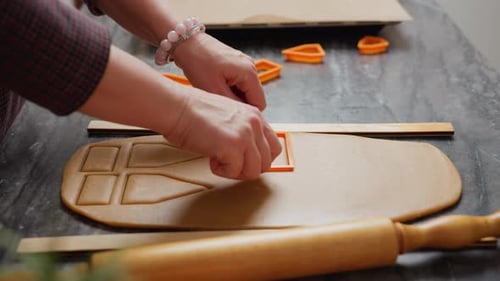 Cutting Christmas Gingerbread Cookies with Cookie Cutters
