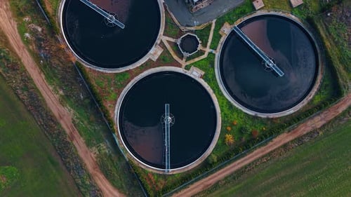 Huge round reservoirs of wastewater. Top view.