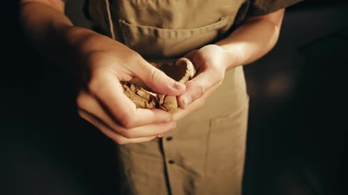 Woman Potter Works with Clay on Master Class in Studio Working Process in Ceramic Workshop Potter
