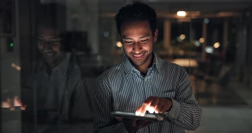 Man, tablet and review at startup, night and scroll with feedback for story at media company