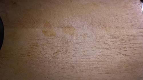 Completing Turkey and Cheese Sandwich on Cutting Board