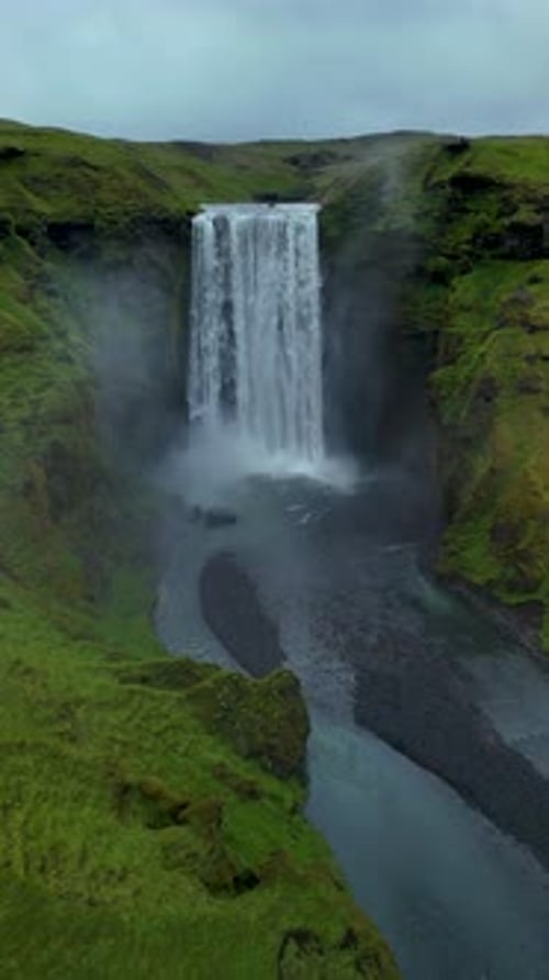 Majestic Seljalandsfoss Waterfall Cascading Down Rocky Cliffs in Icelands Stunning Landscape