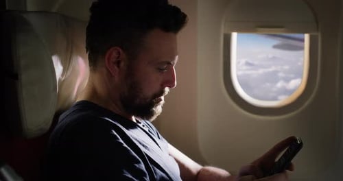 Cinematic shot of Man in aiplane