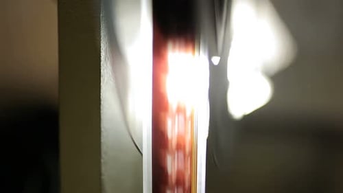 Rotating cinema filmstrip close up for hollywood movie theater presentation