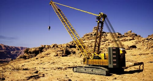 Heavy Machinery Operates in a Desert Landscape for Construction Project