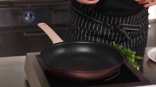 chef preparing tasty food on kitchen table