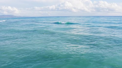 Flying Over Big Ocean Waves