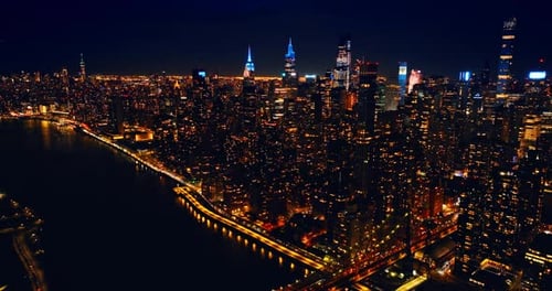 Descending over the dazzling scenery of New York at night.