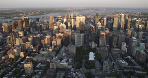 Aerial view of the Centre-Ville cityscape of sunlit downtown Montreal, in Canada