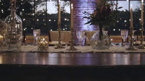 Romantic Table Setting with Candles and Flowers