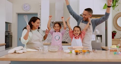 Happy Family Baking Together in the Kitchen