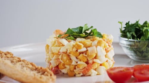 Delicious and Fresh Salad Displayed on White Plate