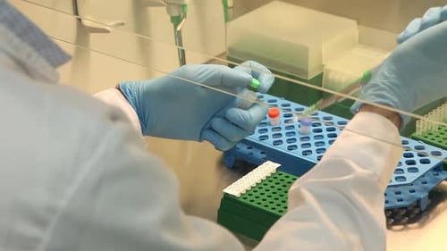Scientist Working in a Brightly Lit Laboratory